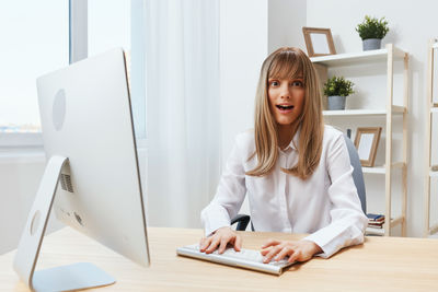 Young businesswoman working at office