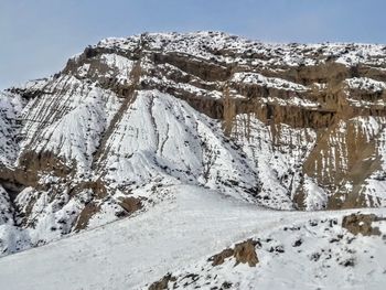 Snow covered mountain against sky