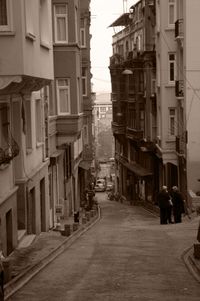 Narrow alley along buildings