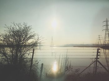 Sun shining over sea