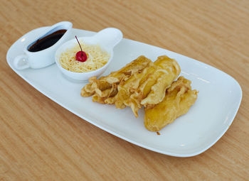 Close-up of food served on table