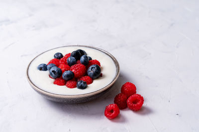 High angle view of strawberries in bowl