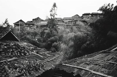 High angle view of houses and buildings against sky