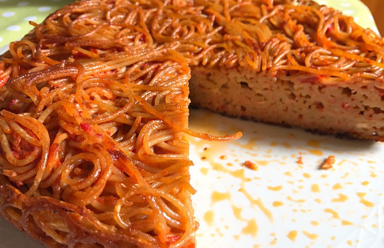 CLOSE-UP OF NOODLES SERVED ON PLATE