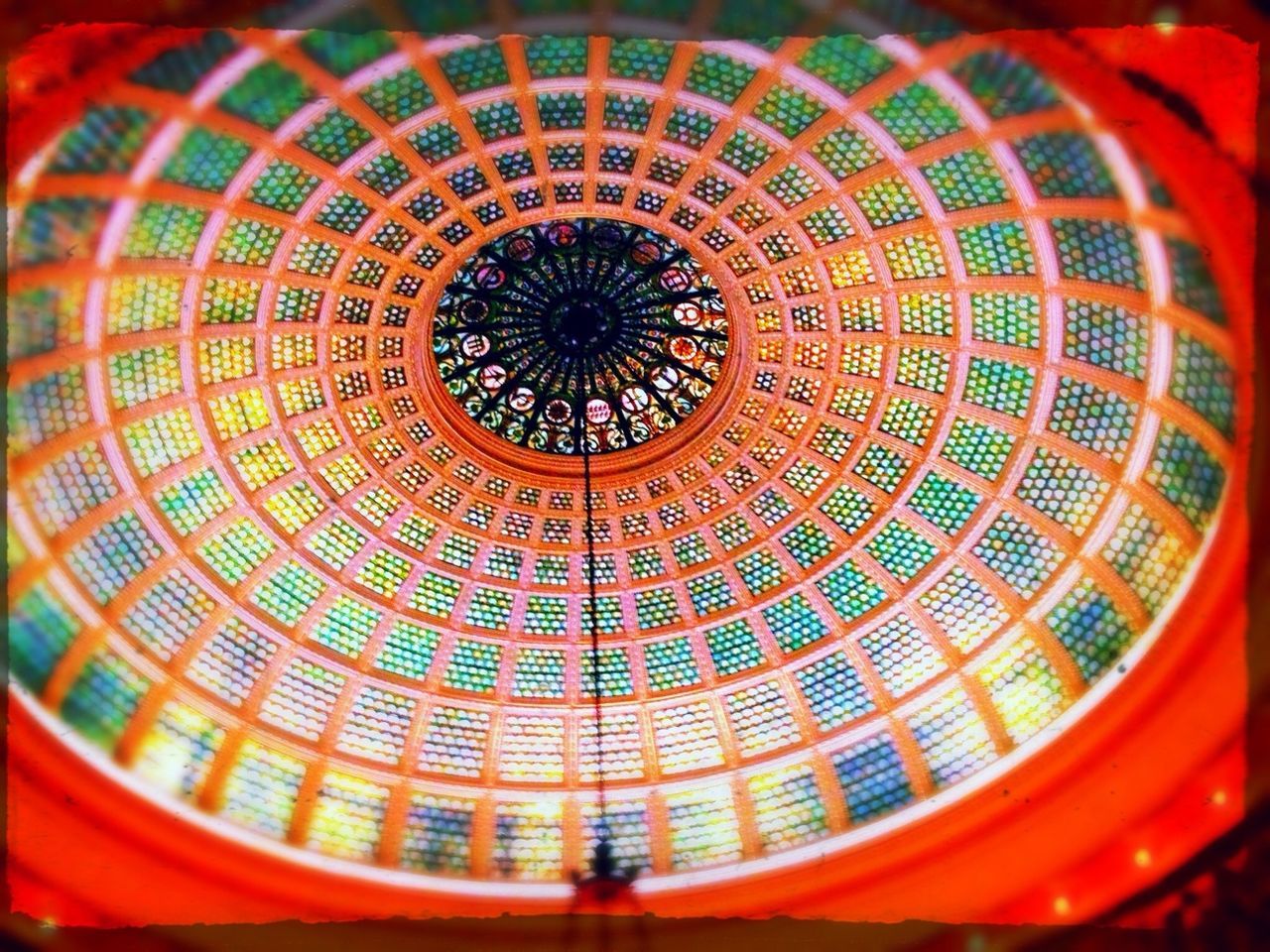 indoors, pattern, low angle view, design, ceiling, ornate, circle, architecture, architectural feature, built structure, geometric shape, religion, place of worship, dome, illuminated, directly below, no people, famous place, architectural design, full frame