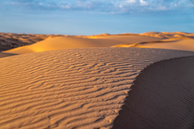 Scenic view of desert against sky