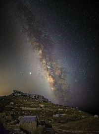 Scenic view of star field against sky at night