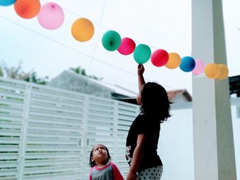 Children and their colorful balloons