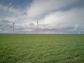 Stormy clouds over windmills