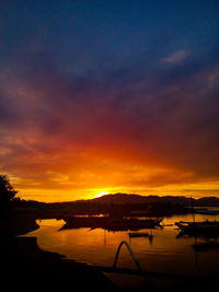Silhouette of marina at sunset