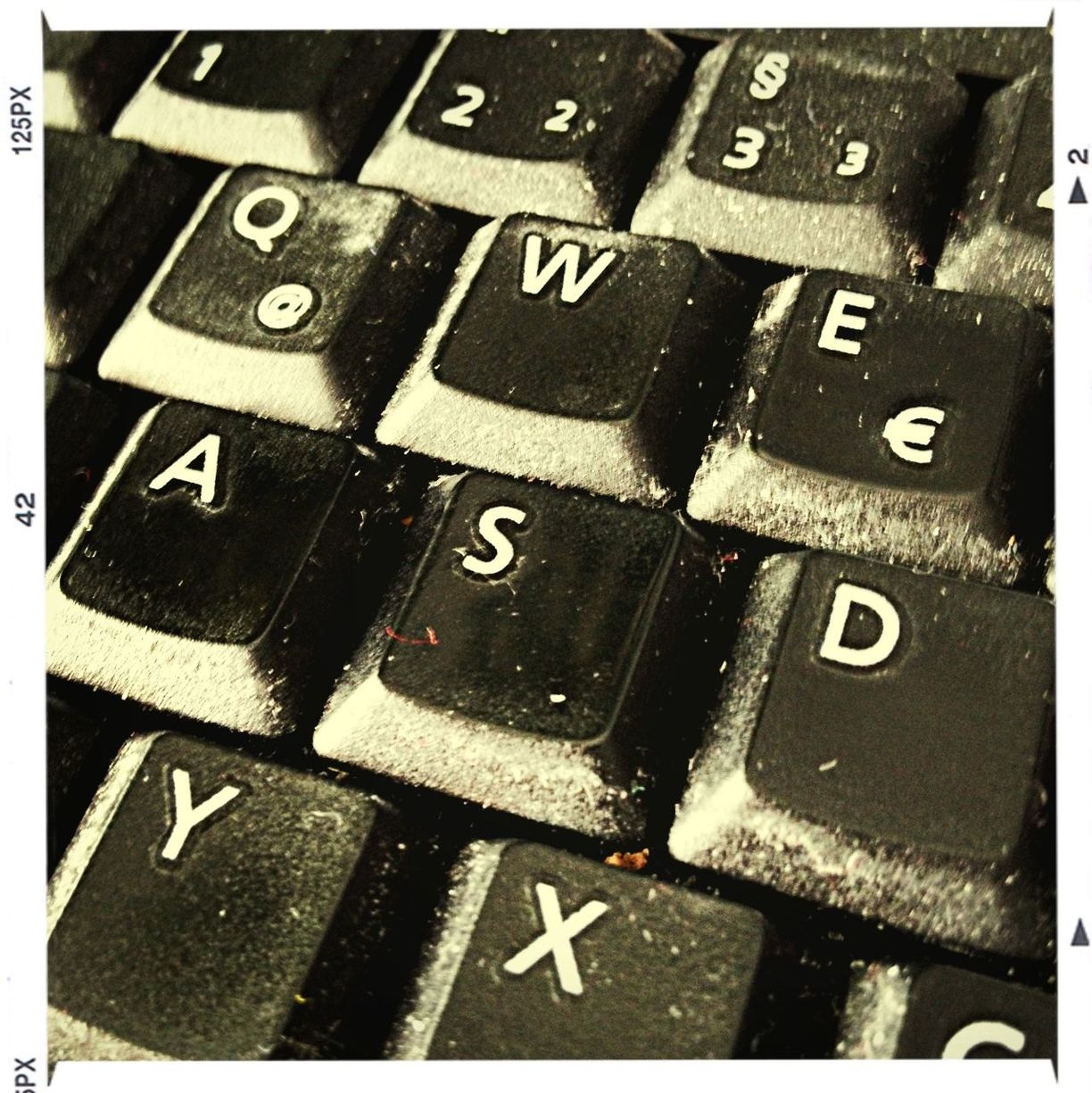 indoors, communication, close-up, number, computer keyboard, high angle view, text, alphabet, full frame, technology, backgrounds, western script, connection, computer key, selective focus, transfer print, capital letter, still life, wireless technology, no people