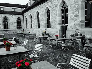 Chairs and table by window