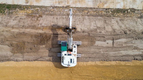 Aerial view of construction machinery on landscape