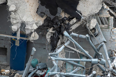 Abandoned shopping cart on metal