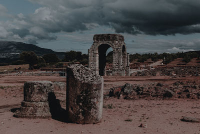 Old ruin building against cloudy sky