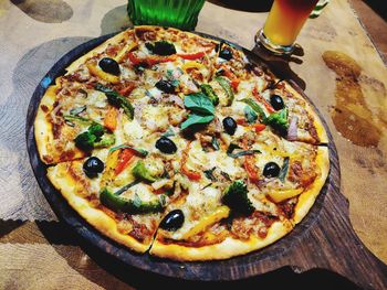 High angle view of pizza on table