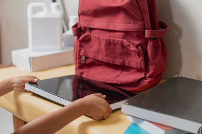 Midsection of man working in office