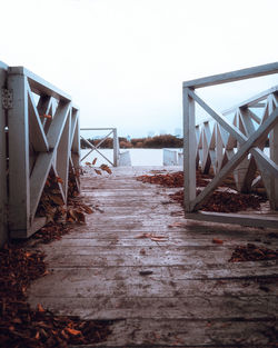 Bridge over sea against clear sky