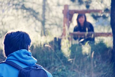 Rear view of person outdoors