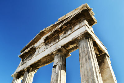 Low angle view of old ruins against clear sky