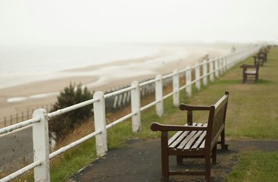 Empty bench on beach