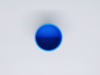 High angle view of blue coffee against white background