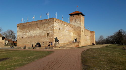 View of fort against blue sky