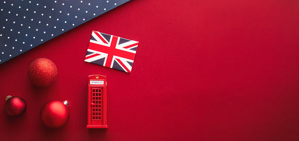 Directly above shot of christmas decoration on yellow background