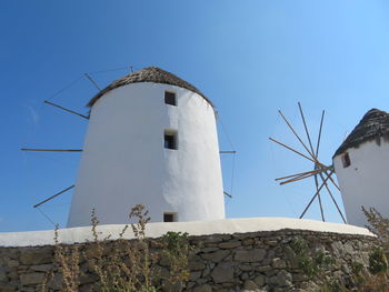 Low angle view of building against blue sky