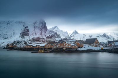 Scenic view of snowcapped mountains against sky during winter