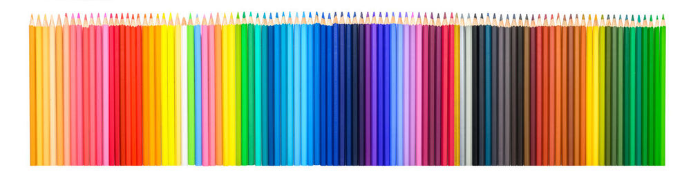 Multi colored pencils in row