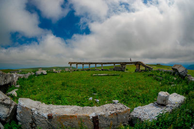 Built structure on land against sky