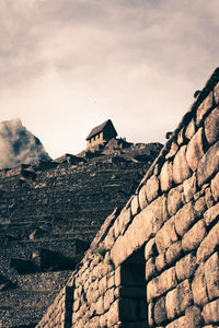 Low angle view of old ruin against sky