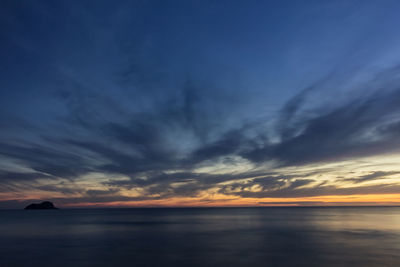 Scenic view of sea against dramatic sky