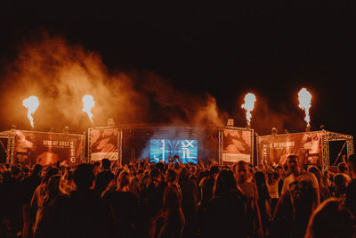 Group of people at music concert