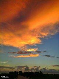 Scenic view of dramatic sky during sunset