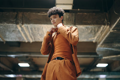 Side view of young man looking away