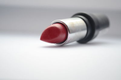 Close-up of lipstick on white background