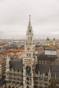 Buildings in city against sky