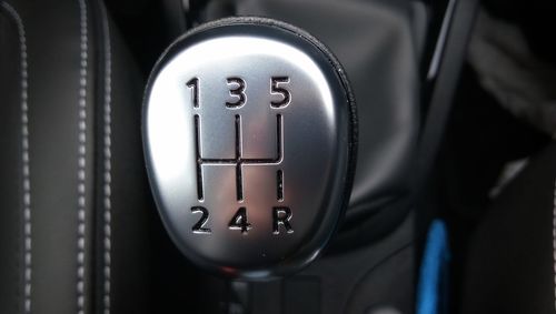 Close-up of gearshift in car