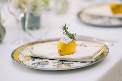 Close-up of fruit in plate on table