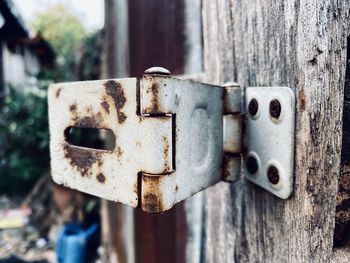 Close-up of old rusty metal door