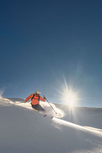 Man skiing on snow