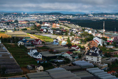 High angle shot of townscape against sky