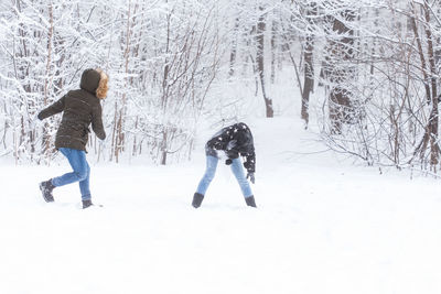 Full length of a horse on snow covered field