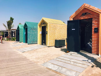 Buildings against blue sky on sunny day