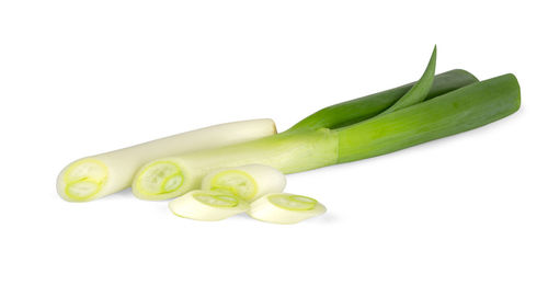 Close-up of green pepper against white background