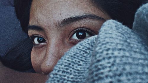 Close-up portrait of young woman