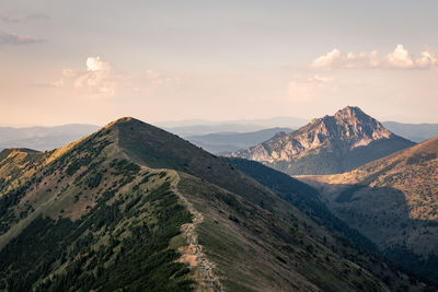 Scenic view of mountains against sky during sunset