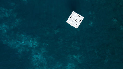 Aerial view of floating platform in sea